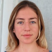 <b>Maya Beleznay - 2026 Wonderfest Science Envoy</b> <br> <p>Maya Beleznay is a third-year PhD candidate at Stanford University, advised by Roger Romani. Her work focuses on the search for the most massive neutron stars to better our understanding of the equation of state at supranuclear densities. To do this, she studies the light curves of ‘black widow pulsars’ – binary systems where a rapidly spinning neutron star ablates its closely-bound companion, blowing off material whose mass is transferred to the neutron star, forming the heaviest such objects known to date. Outside of research, she is passionate about science outreach and mentoring students in the US and Hungary.</p> Maya Beleznay - 2026 Wonderfest Science Envoy